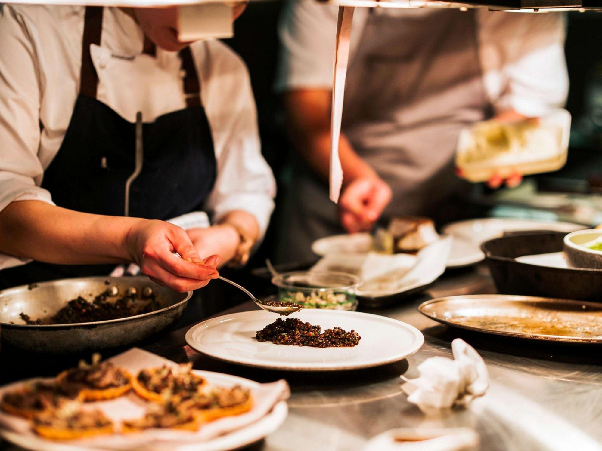 The Playford Adelaide - Mgallery Eksteriør bilde A chef plating a dish